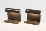 Jean Prouvé, Paire de lampes de bureau, A pair of office desks in lacquered steel designed by Jean Prouvé in 1930 and edited by Vitra G-Star RAW in 2015