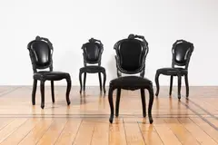 Maarten Baas, Paire de chaises de la série Smoke, A pair of chairs from the 'Smoke' series in burned wood, epoxy resin and leather designed by Maarten Baas in 2002