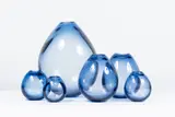 Per Lütken, Ensemble de six vases Drop, A set of six monogrammed and numbered 'Drop' vases in tinted blown glass designed by Per Lütken and edited by Holmegaard circa 1960