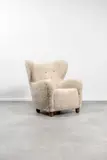 Travail Danois, Fauteuil, A Danish armchair in stained wood and wool circa 1940