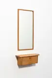 Ludvig Pontoppidan, Un miroir et une console murale, A mirror and a wall console in oak and mirrored glass designed by Ludvig Pontoppidan circa 1950