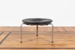 Tabouret PK33 by Poul Kjaerholm, An impressed 'PK33' stool in polished steel, lacquered wood and leather designed by Poul Kjaerholm in 1958 and edited by, sold Jan 2025