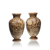 Robert Wallace Martin, for Martin Bros., 1883, Glazed stoneware, of baluster form, incised with serpents among foliage against a buff ground