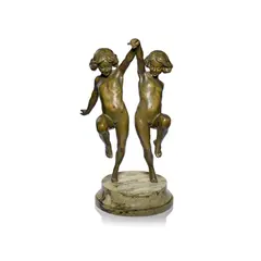 'Danse Rhythmique' by Claire Jeanne Roberte Colinet, circa 1930, Green patinated bronze, modelled as two young girls dancing, on circular green marble base, sold Dec 2024