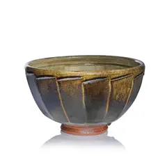 Richard Batterham, Large cut bowl, Stoneware, running dark green over iron glazes with cut-sided exterior, pale green ash glaze with iron speckle and banding to the interior
