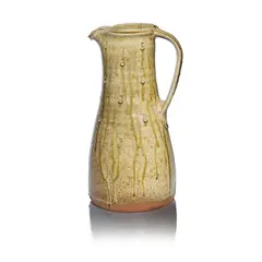 Jim Malone, Tall jug, Stoneware, mottled green ash and running olive glazes with carved decoration