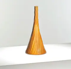 Christopher Dresser, for Linthorpe Art Pottery, 1879-82, Glazed earthenware, of tapering form, the ochre glazed ground incised with spiralling decoration