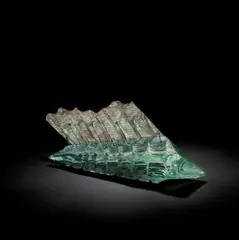 'Flagship', sculpture by Keith Cummings, 1991, Kiln formed glass, copper-patinated and polished, offered May 2025