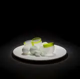 Composition with vessels by Rachael Woodman and Neil Wilkin, 1996, Clear glass decorated in white, sold May 2025