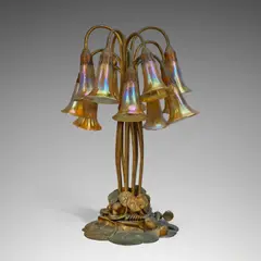 Twelve-Light 'Lily' Table Lamp by Tiffany Studios, Favrile glass, bronze with etched doré finish, base stamped 'TIFFANY STUDIOS NEW YORK 382', each favrile shade etched 'L, sold Dec 2025
