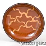 David Smith, W. SMITH / WOMELSDORF Pennsylvania Redware Plate with Yellow Slip Decoration