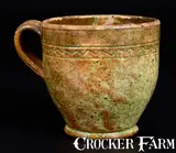 Rare S. BELL & SON / STRASBURG Large-Sized Redware Handled Cup with Copper Glaze by S. Bell & Son, circa 1890, Redware, sold Jul 2016