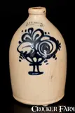 J. & E. NORTON / BENNINGTON, VT Stoneware Jug with Flowering Urn Decoration by J. & E. Norton, circa 1855, Stoneware, sold Mar 2016