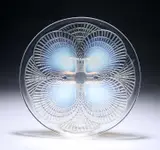 René Lalique (French, 1860-1945), A 'Coquilles' Plate by René Lalique, glass, moulded 'R, sold Apr 2023