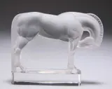 René Lalique (French, 1860-1945), A Cheval Paperweight by René Lalique, glass, frosted and polished, moulded 'R, sold Oct 2022