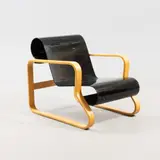 Alvar Aalto, An armchair, model 41 "Paimio", Artek, later 20th century, lacquered and black-painted birch