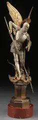 Léon Pilet, The Archangel Michael Defeating Satan, Bronze with silver, gilt and brown patina mounted on a circular rouge marble base