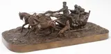 Evgeny Aleksandrovich Lanceray, A Winter Troika Scene with Riders Shooting a Pursuing Wolf, Bronze with dark brown patina