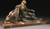 Ugo Cipriani, Seated Woman with Greyhound -, Patinated spelter and faux ivory on an onyx base