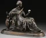 Auguste Joseph Peiffer, A Classical Maiden Reclining on a Lounge Contemplating a Flower, Bronze with dark brown patina