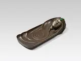 Gustav Gurschner, Filing for a feather, bronze, cast, patinated, partly silver plated, malachite; signed on the rim, inscribed on the lower surface