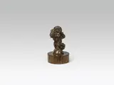 Michael Powolny, Small putto "Spring, bronze, cast, patinated; wood base later