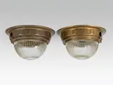 Otto Wagner, Pair of Ceiling lights for the Wiener Stadtbahn, brass, patinated; glass; slightly traces of usage