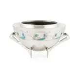 Archibald Knox, 'TUDRIC' PEWTER AND ENAMEL-SET ROSE BOWL, CIRCA 1900, 1900, embossed with stylised honesty seed pods and stems and with applied enamels