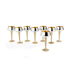 Stuart Devlin, Set of Eight Wine Stemmed Goblets, 1969, 1969, all raised on an inverted tapering textured silver gilt stems to a spreading foot