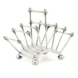ELECTROPLATED ARTICULATED LETTER RACK, 1880s by Christopher Dresser, sold Apr 2020