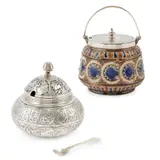 RARE ELECTROPLATED PRESERVE POT AND COVER, CIRCA 1880 by Christopher Dresser, 1880, and a DOULTON, LAMBETH AESTHETIC MOVEMENT SILVER MOUNTED PRESERVE JAR AND COVER, sold Apr 2020