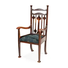 Walter Cave, ARTS & CRAFTS STAINED OAK ARMCHAIR, CIRCA 1900, 1900, the back with stylised plant-form spindles above moulded open arms and later-upholstered drop-in seat