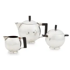 Chris van der Hoef, THREE-PIECE WHITE METAL TEA SERVICE, CIRCA 1925, 1925