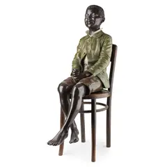 Friedrich Goldscheider, LARGE AUSTRIAN POLYCHROME FIGURE OF A SEATED BOY, CIRCA 1900, 1900, on a bentwood chair