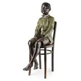 Friedrich Goldscheider, LARGE AUSTRIAN POLYCHROME FIGURE OF A SEATED BOY, CIRCA 1900, 1900, on a bentwood chair