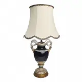 Porcelain Snake Handled Lamp by Meissen, Converted from vase urn form, cobalt glaze with parcel gilt trim, giltwood base scalloped shade with blue and gilt trim, sold Oct 2022