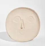 Head with Mask (Tête au masque) by Pablo Picasso, 1956, White earthenware round plate, with decoration in engobes under partial brushed glaze in ivory, green and black on the u, sold Oct 2017