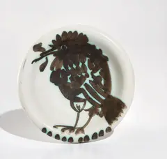 Bird with Worm (Oiseau au ver) by Pablo Picasso, 1952, White earthenware turned round ash-tray painted in white and black; ceramic, Madoura edition, sold Oct 2017