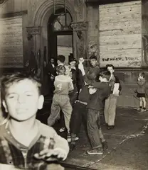 Children (school is over) by Weegee, circa 1940, Gelatin silver print, sold Apr 2017