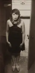 Magda Förstner (Standing in the doorway of Etienne Béothy's studio) by André Kertész, 1926, Gelatin silver print, likely on trimmed carte-postale, sold Oct 2017