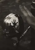 Imre Kinszki, Self-Portrait in Reflection of Car Headlight, circa 1934, Gelatin silver print
