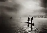 Fishing in the Piulaga Laguna during the Kuarup ceremony of the Waura Group, Upper Xingu Basin, Mato Grosso, Brazil by Sebastião Salgado, 2005, Gelatin silver print, sold Oct 2017