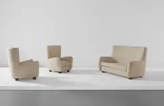 Jean Royere, "Relax" sofa and pair of armchairs, circa 1950, Fabric, oak, beech