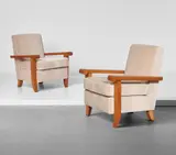 Jacques Adnet, Pair of armchairs, from the Palais des Consuls, Rouen, circa 1954, Stained beech, fabric