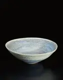 Large bowl by Lucie Rie, circa 1980, Stoneware, mixed clays producing an integral blue and gray spiral, sold Jun 2017