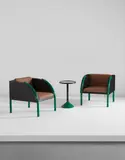 Shiro Kuramata, Pair of armchairs and side table, from the Livina Yamagiwa building, Tokyo