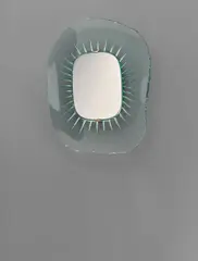 Illuminated mirror, model no. 1657 by Max Ingrand, circa 1958, Chiseled and carved glass, mirrored glass, brass, painted aluminum, offered Jun 2017