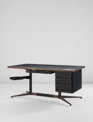 Rare desk by Gio Ponti, circa 1956, Painted steel, brass, laminate-covered wood, rubber, sold Jun 2017