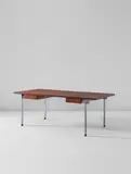Desk, model no. AT 325 by Hans J. Wegner, circa 1961, Brazilian rosewood-veneered wood, matte chromium-plated steel, brass, offered Dec 2017