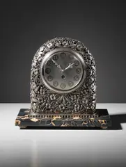 Mantle clock by Edgar Brandt, 1920s, Silver-plated iron, silver-plated brass, marble, glass, sold Dec 2017